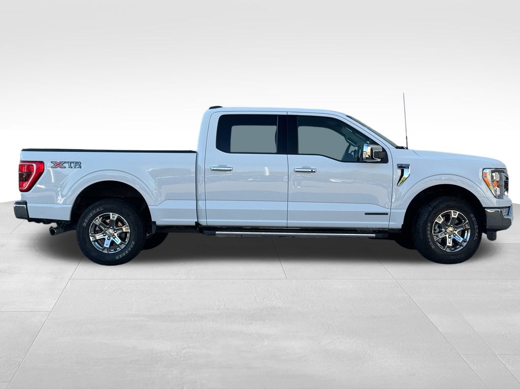 Used 2021 Ford F-150 XLT with VIN 1FTFW1ED7MFB73088 for sale in Coon Rapids, Minnesota