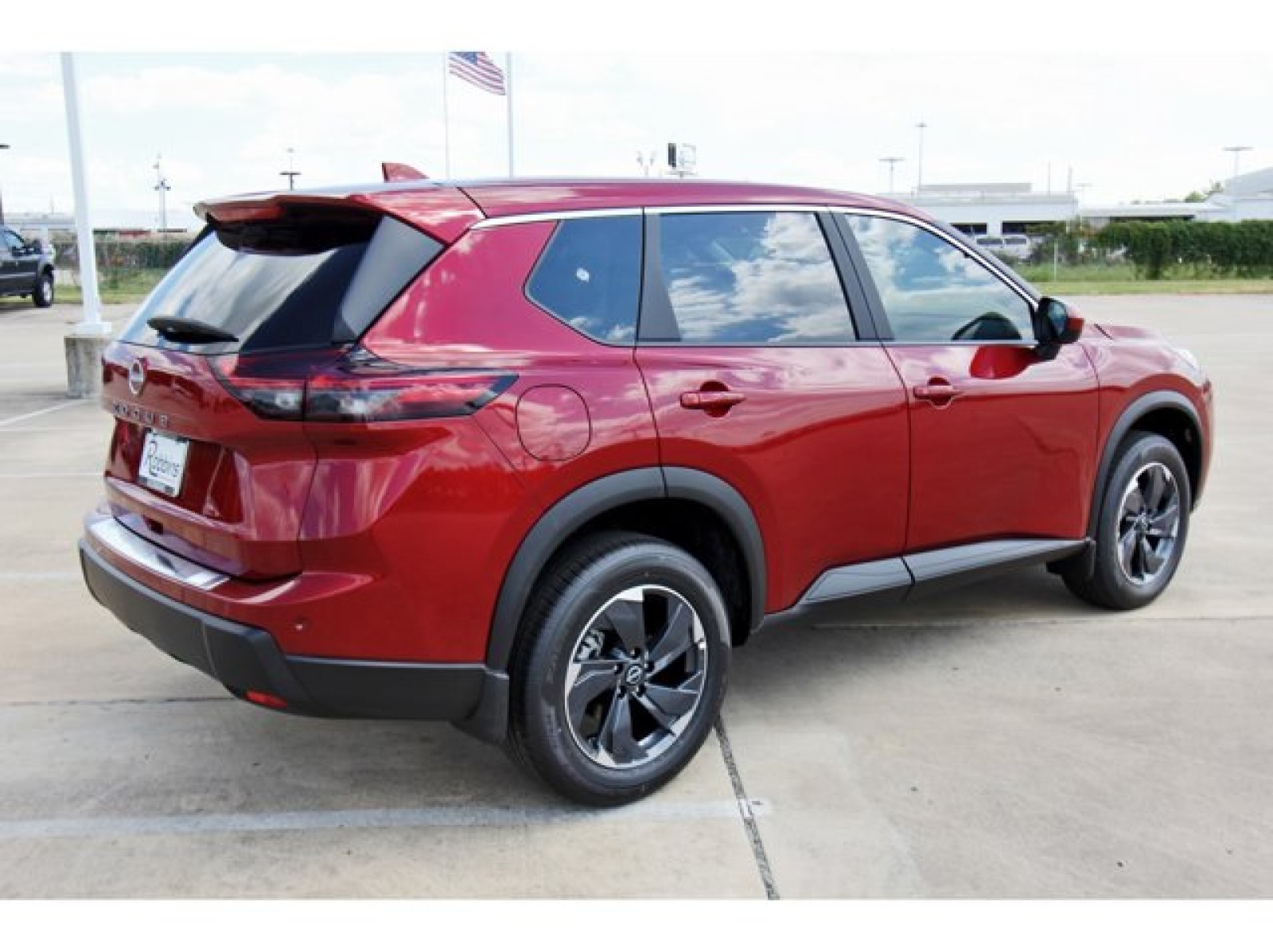 2026 Nissan Rogue SV Red at Robbins Nissan