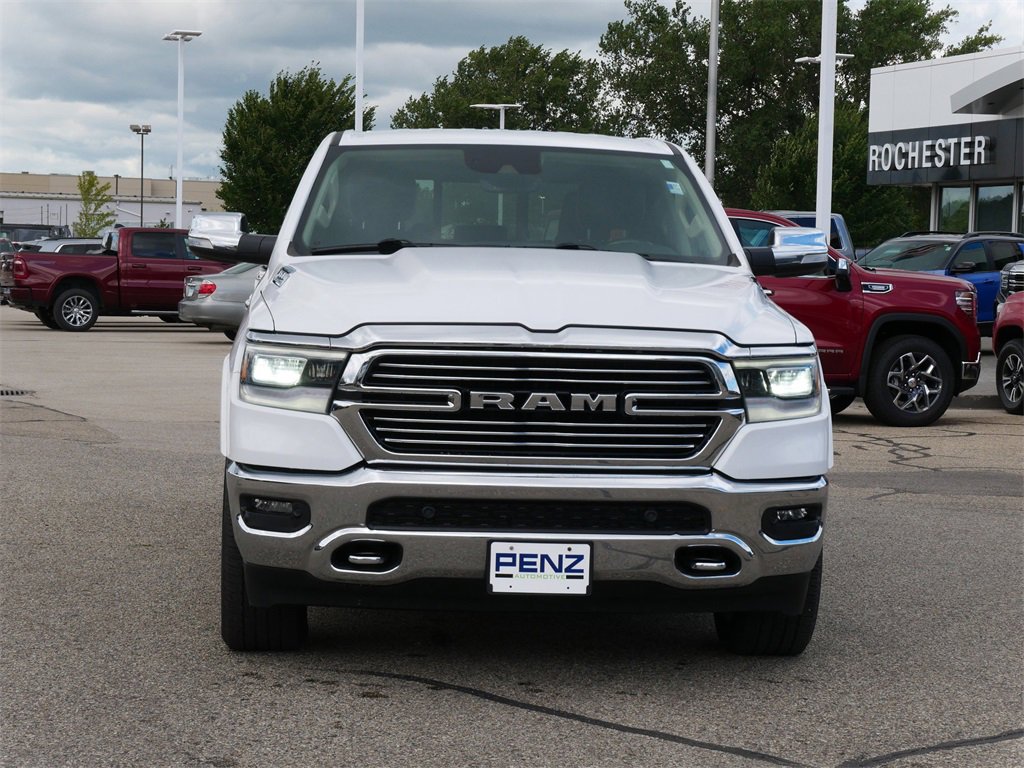 Used 2021 RAM Ram 1500 Pickup Laramie with VIN 1C6SRFJTXMN652859 for sale in Rochester, Minnesota