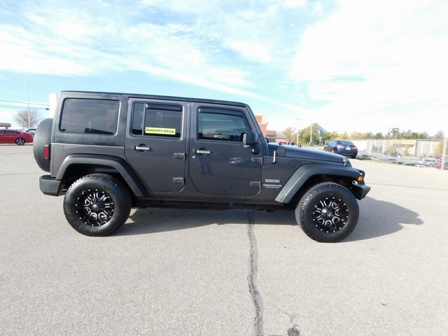 Used 2014 Jeep Wrangler Unlimited Sport with VIN 1C4BJWDG7EL253029 for sale in Richmond, IN