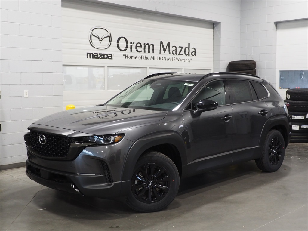 New 2025 Machine Gray Metallic Mazda Premium AWD image 1