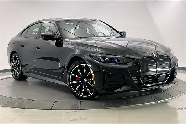 Used 2025 Black Sapphire Metallic BMW  image 1