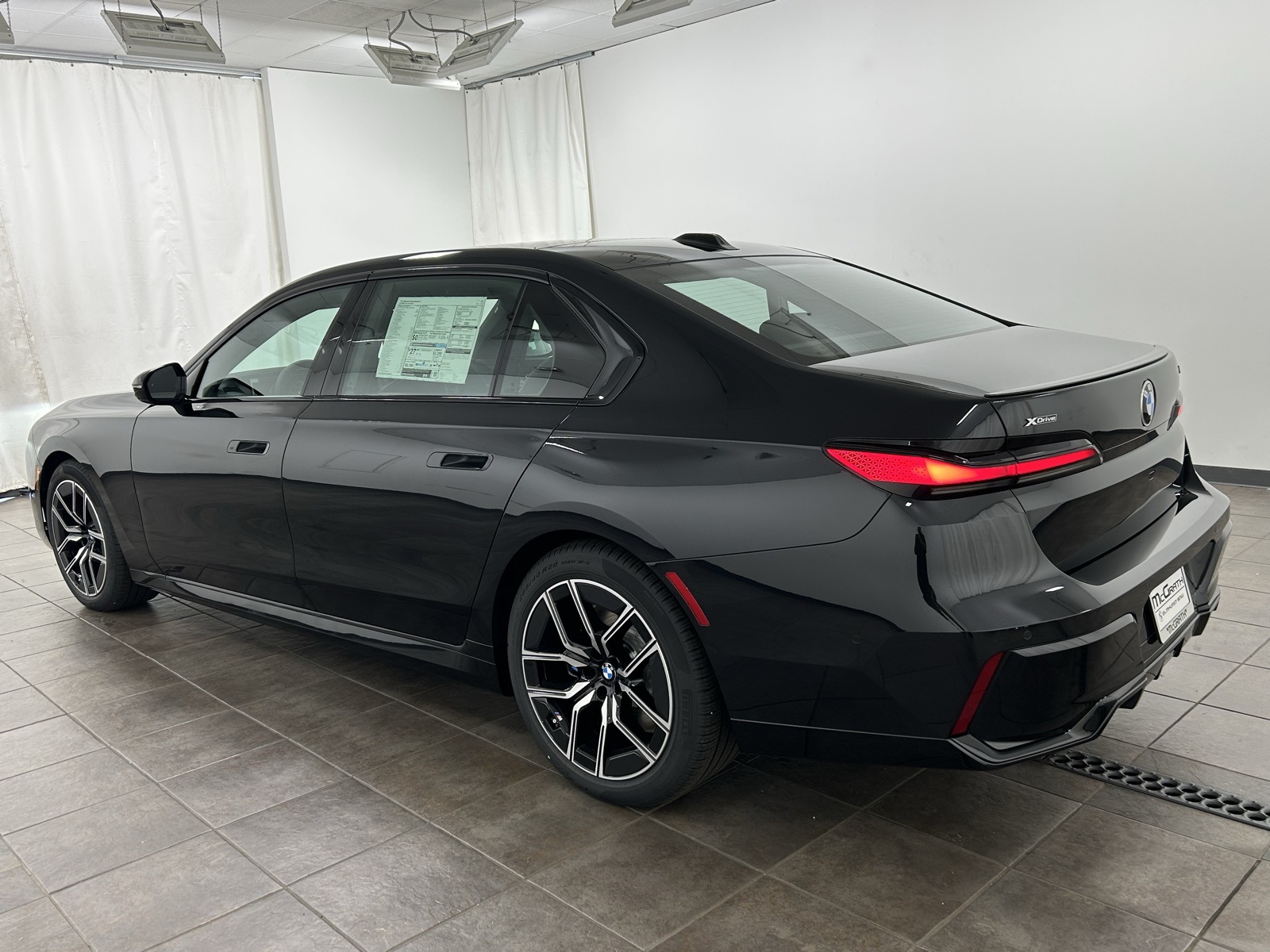 New 2025 Black BMW 740i xDrive image 3