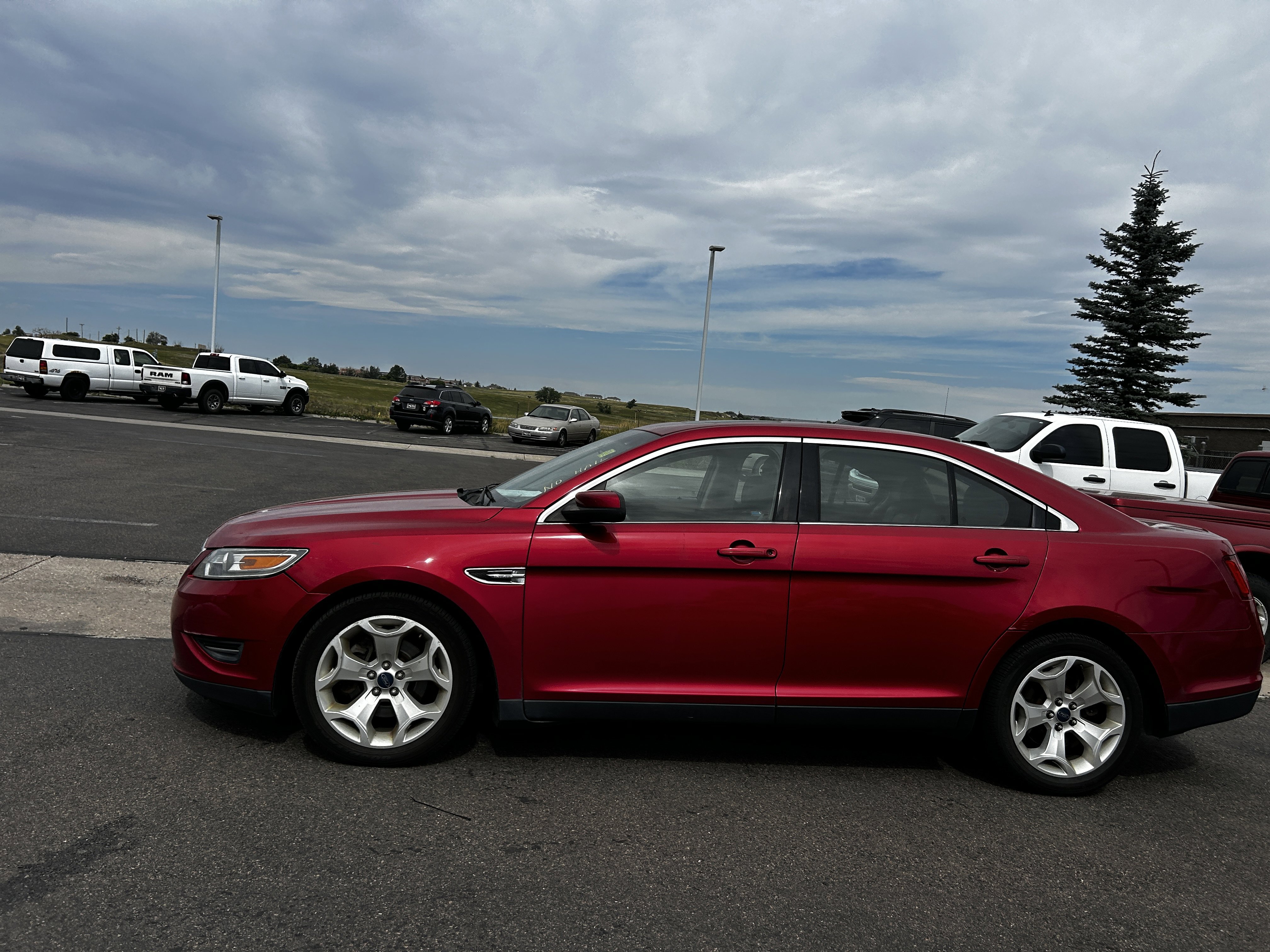 Used 2012 Ford Taurus SEL with VIN 1FAHP2EW5CG123379 for sale in Cheyenne, WY