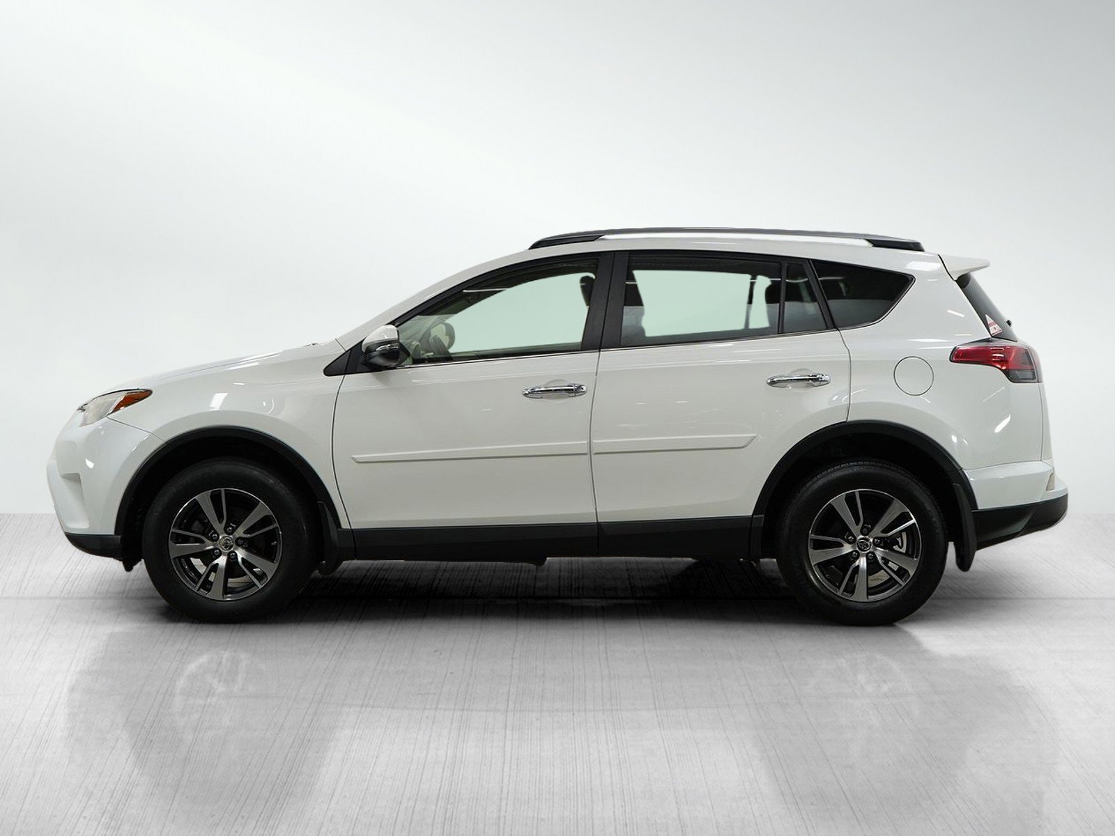 Used 2017 Toyota RAV4 XLE with VIN JTMRFREV6HD211173 for sale in Minneapolis, Minnesota