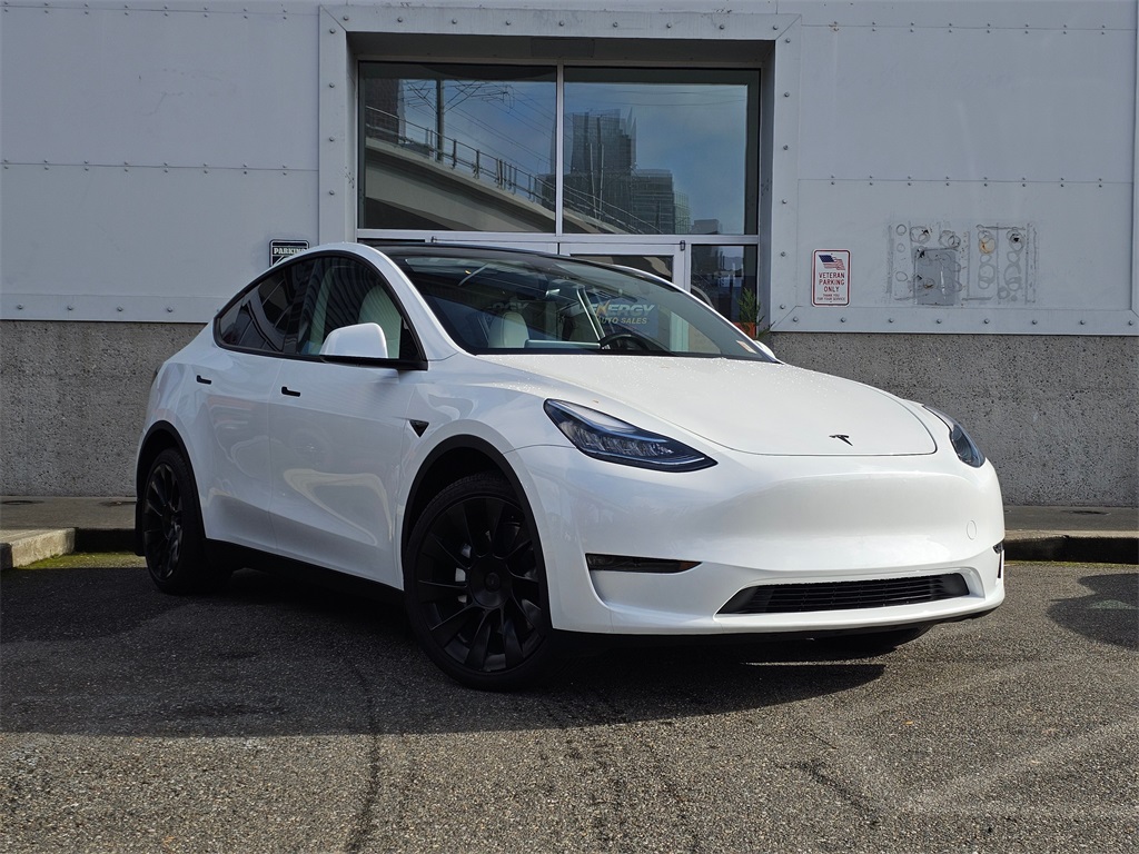 Used 2023 Tesla Model Y Long Range with VIN 7SAYGDEEXPA111290 for sale in North Bend, WA