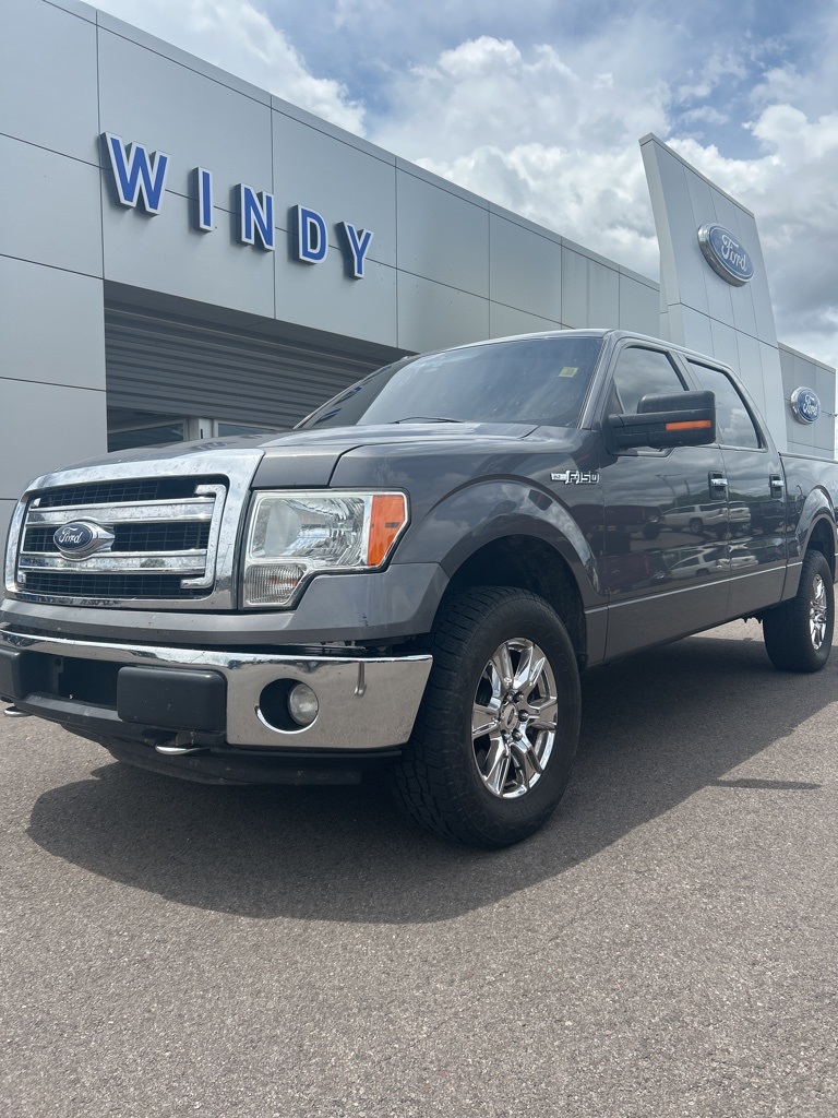Used 2013 Gray Ford XLT image 1