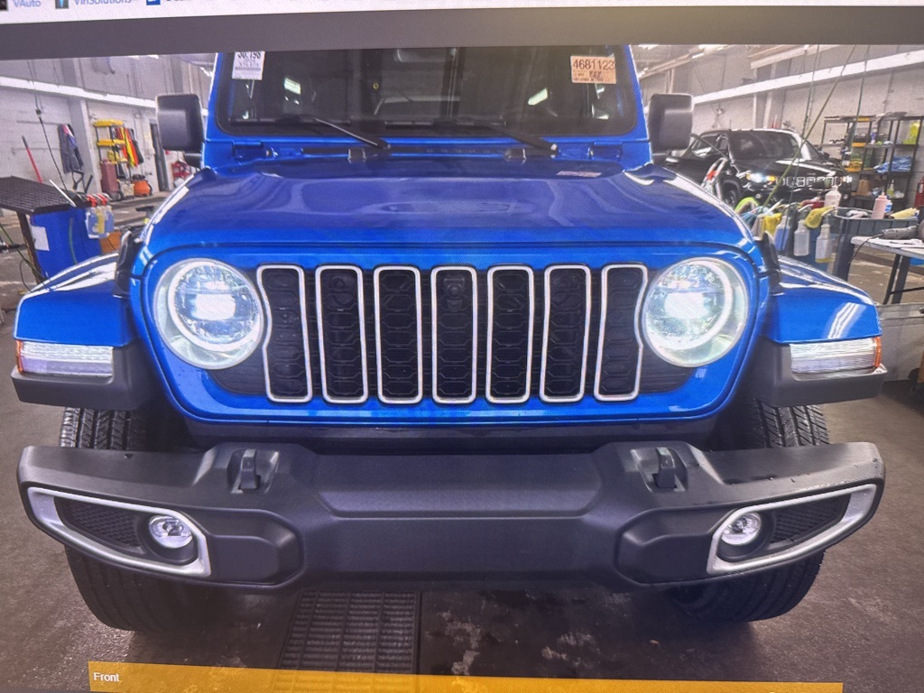 Used 2024 Jeep Wrangler 4-Door Sahara with VIN 1C4PJXEG2RW335717 for sale in Kansas City