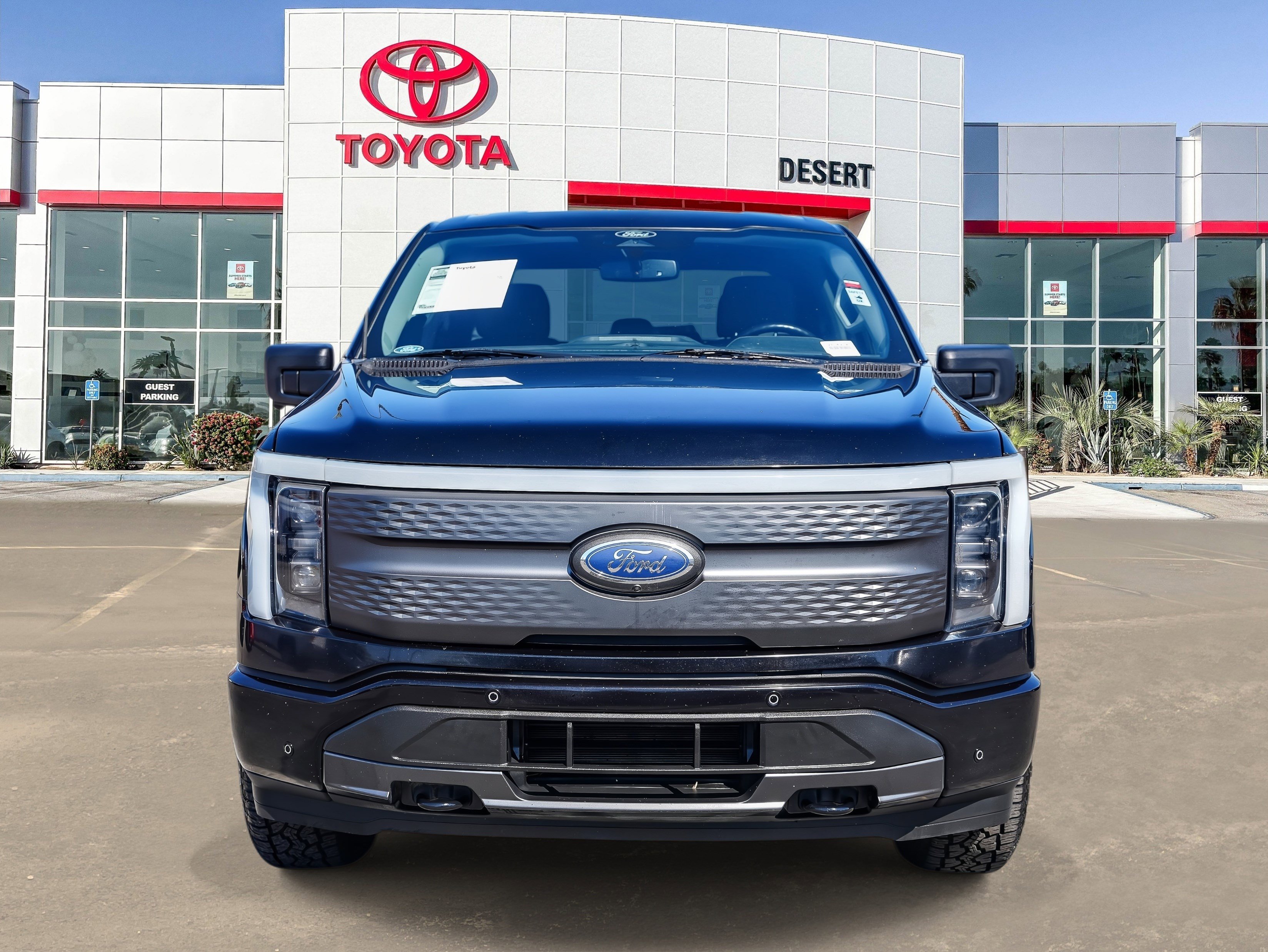 Used 2022 Ford F-150 Lightning XLT with VIN 1FTVW1ELXNWG09520 for sale in Cathedral City, CA