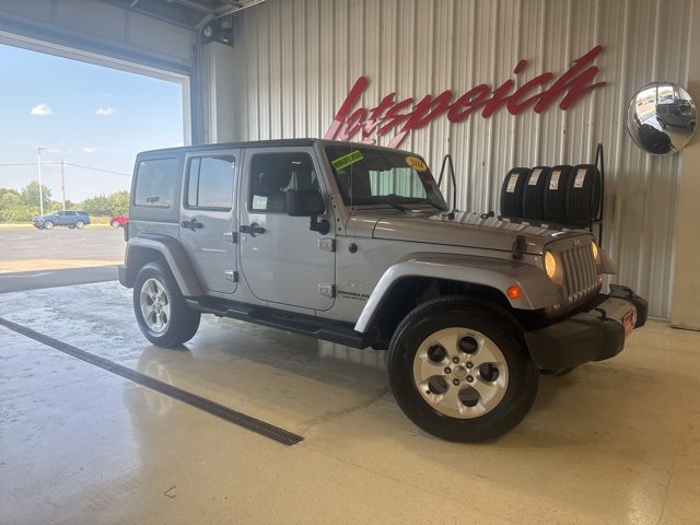 Used 2014 Jeep Wrangler Unlimited Sahara with VIN 1C4BJWEG1EL114061 for sale in Kansas City