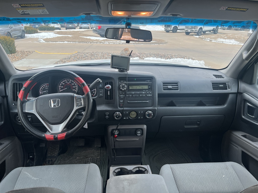 Used 2012 Honda Ridgeline RT with VIN 5FPYK1F21CB003756 for sale in Pella, IA