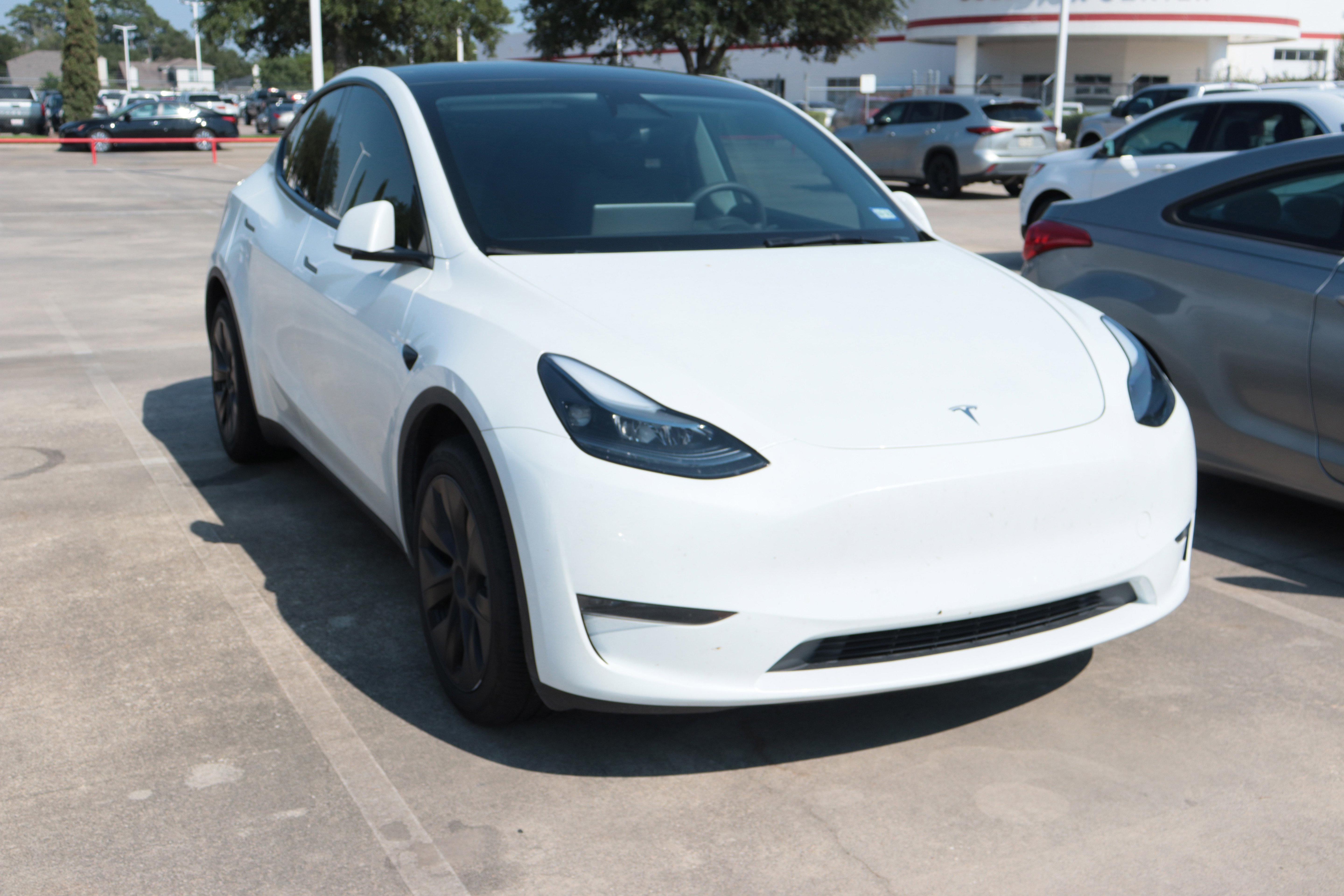 Used 2024 Tesla Model Y Long Range with VIN 7SAYGDED4RA335438 for sale in Northfield, Minnesota