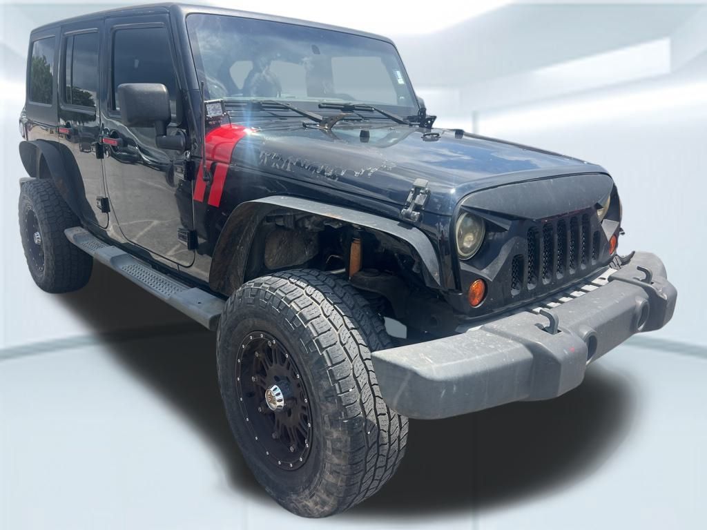 2011 Jeep Wrangler Unlimited Sahara photo 2
