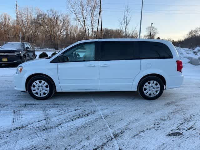 Used 2014 Dodge Grand Caravan SE with VIN 2C4RDGBGXER292168 for sale in Minneapolis, Minnesota