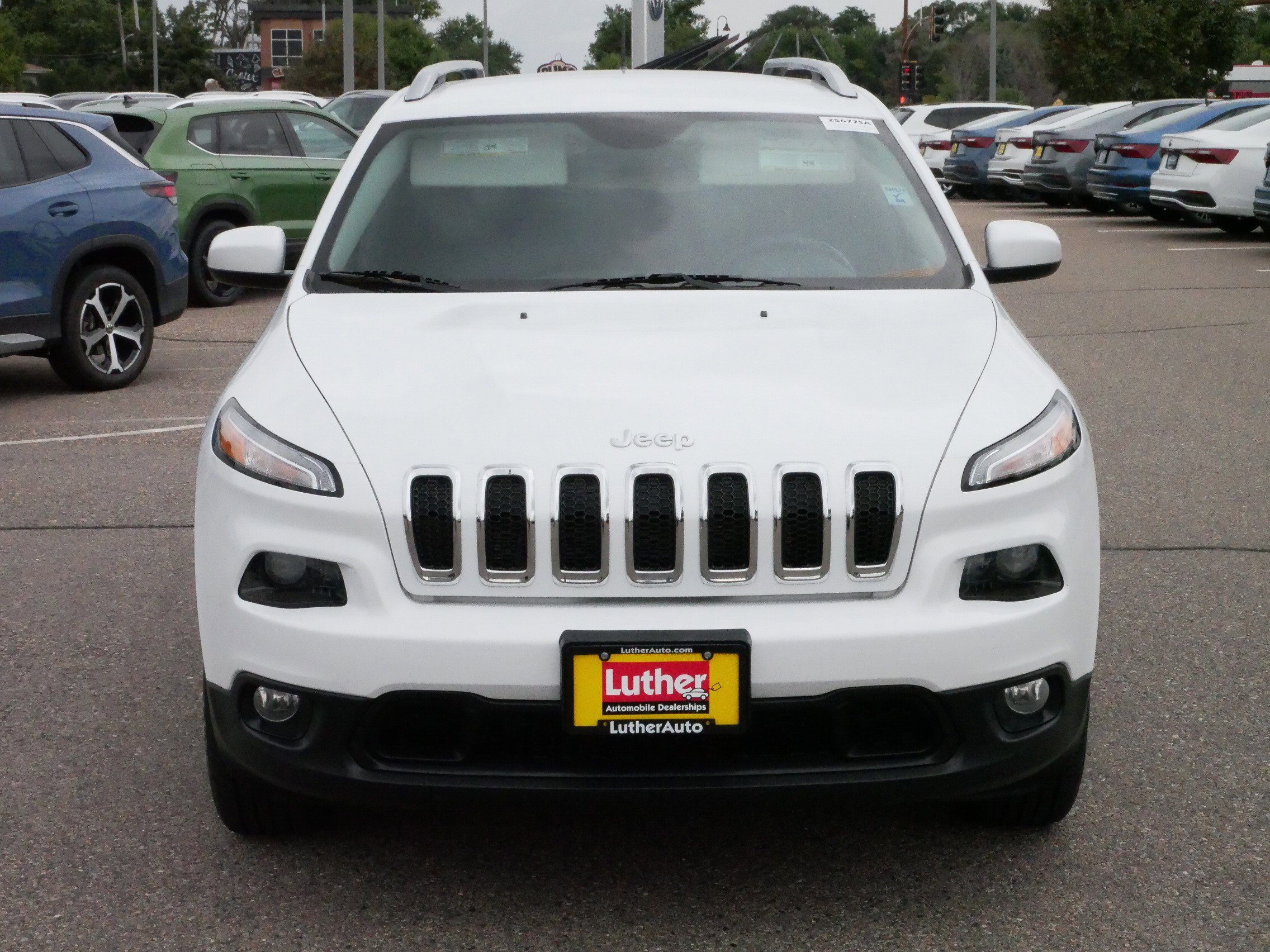 Used 2015 Jeep Cherokee Latitude with VIN 1C4PJMCS6FW774503 for sale in Brooklyn Center, Minnesota
