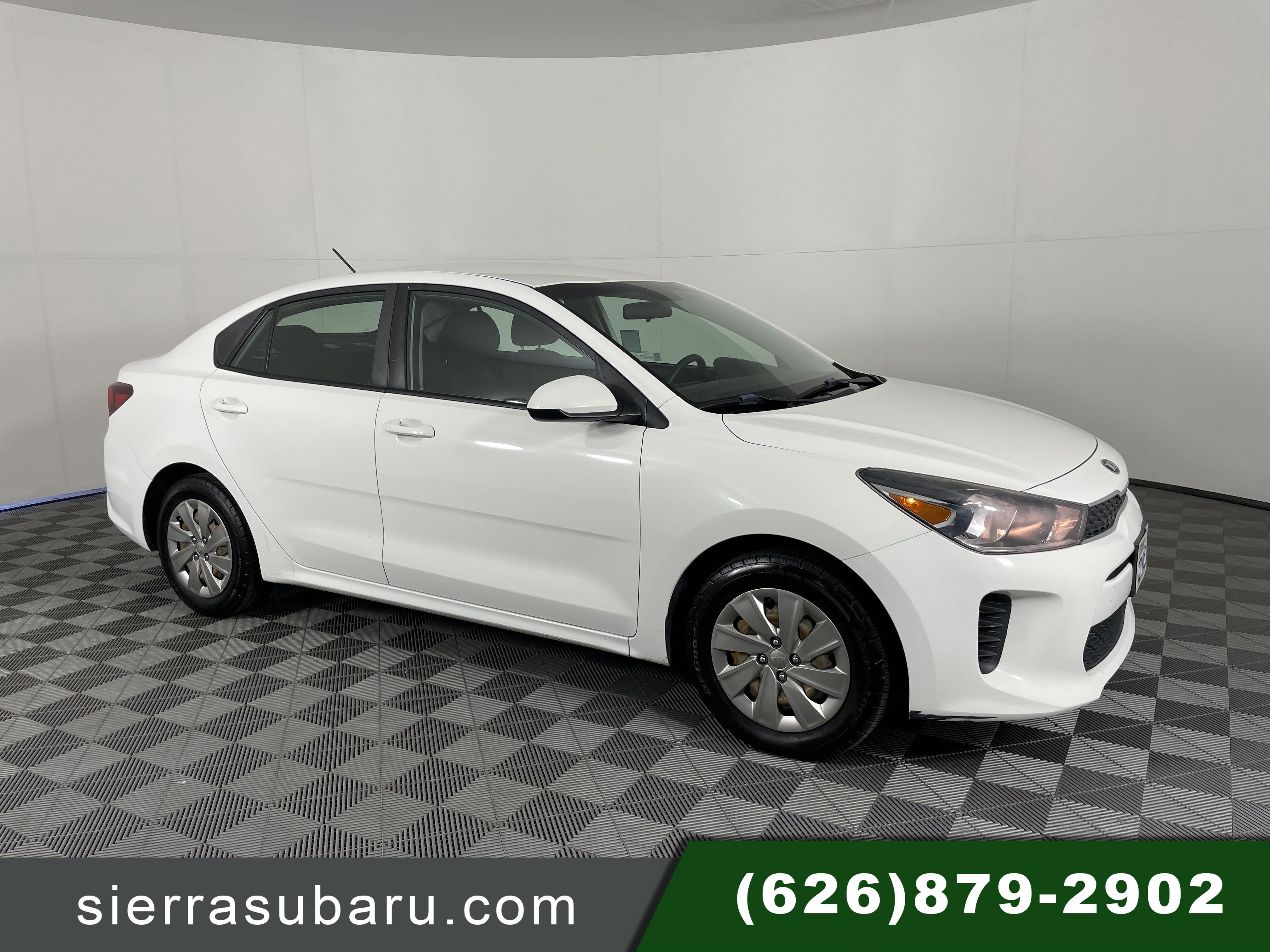Used 2018 Clear White Kia S image 1
