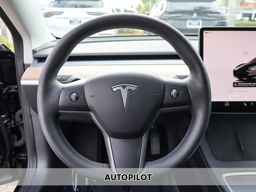 Used 2022 Tesla Model 3 Base with VIN 5YJ3E1EA9NF322263 for sale in Miami, FL