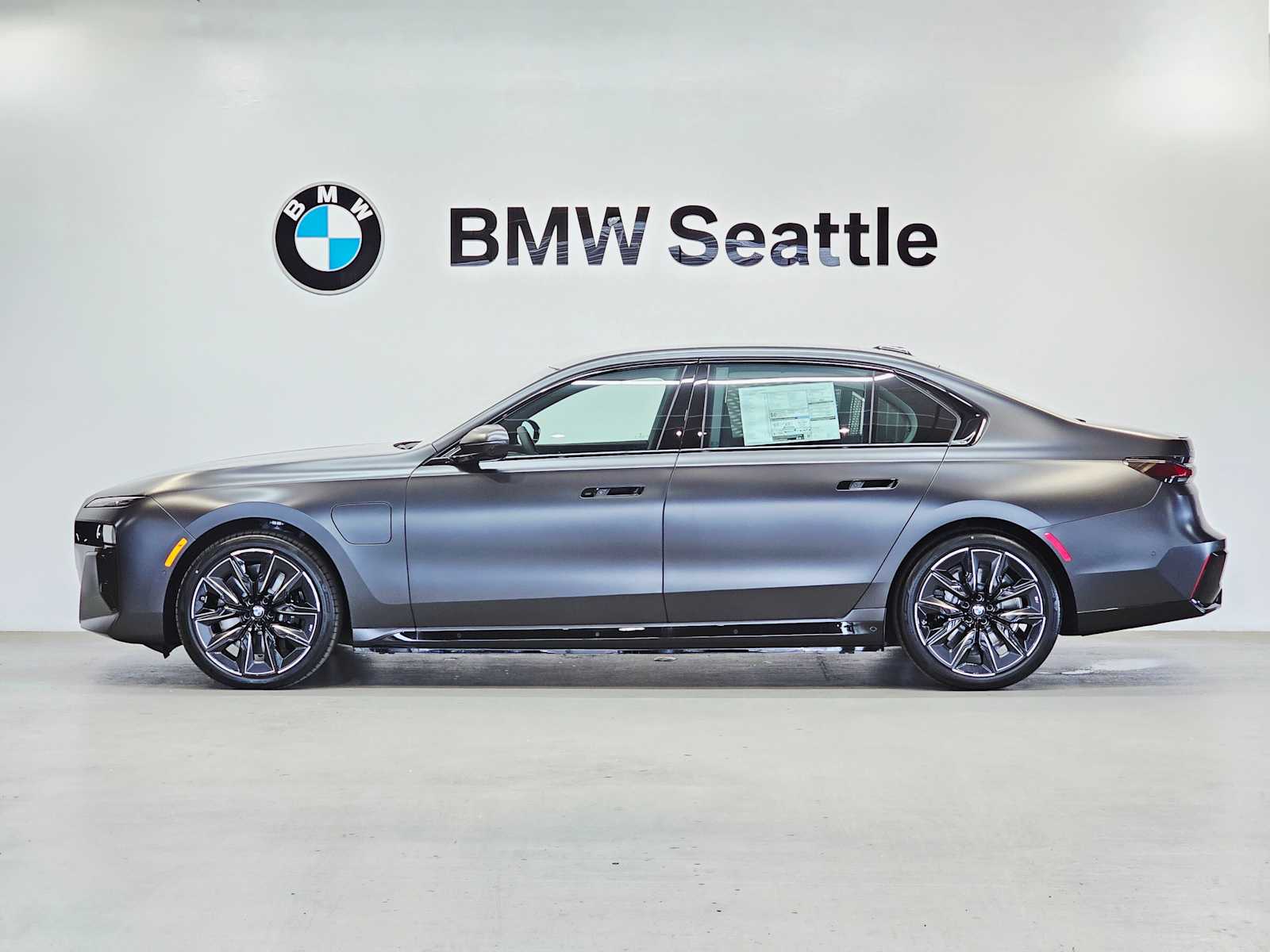 New 2025 Frozen Deep Grey Metallic BMW 750e xDrive image 3