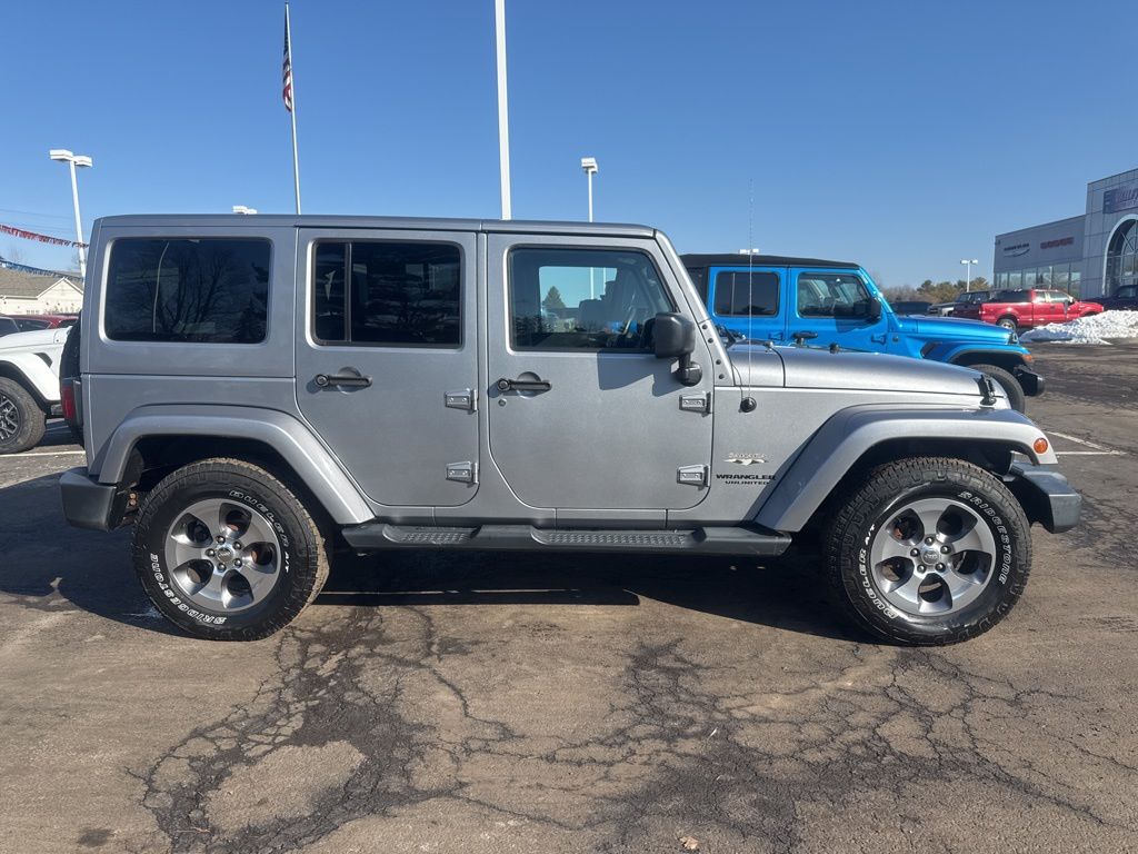 Used 2016 Jeep Wrangler Unlimited Sahara with VIN 1C4BJWEG3GL108233 for sale in Pataskala, OH