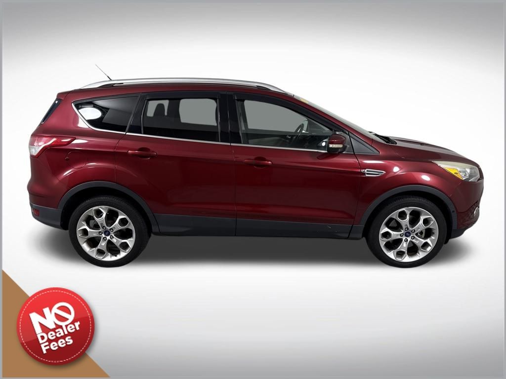 Used 2016 Ford Escape Titanium with VIN 1FMCU9JX6GUC42596 for sale in Clermont, FL