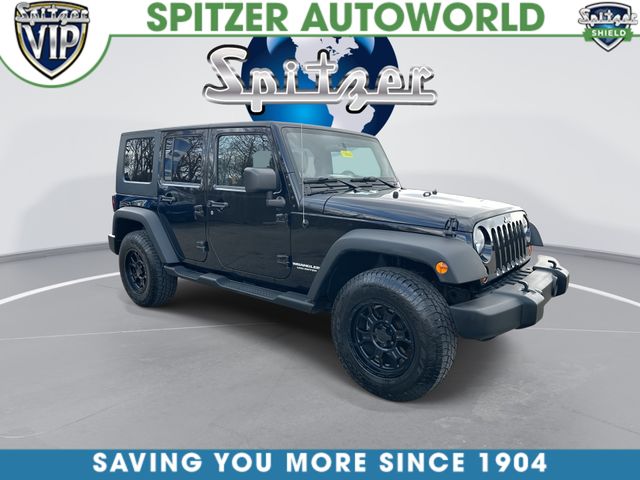 Used 2010 Jeep Wrangler Unlimited Sport with VIN 1J4BA3H17AL163369 for sale in Hartville, OH