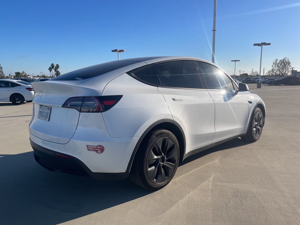 Used 2024 Tesla Model Y Long Range with VIN 7SAYGDED5RF110755 for sale in Kansas City