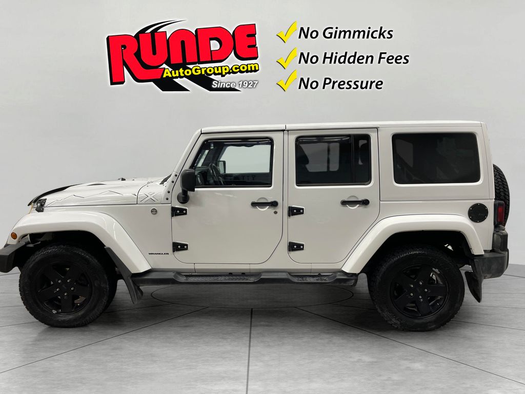 Used 2015 Jeep Wrangler Unlimited Sahara with VIN 1C4BJWEG0FL627934 for sale in Manchester, IA