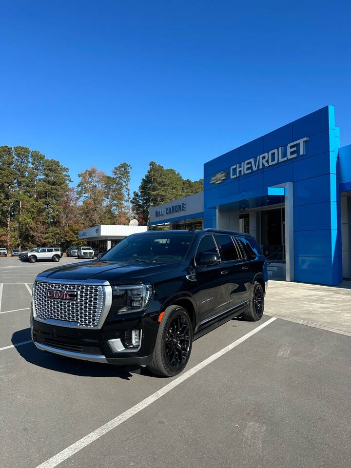 Used 2023 Black GMC AT4 4x4 4dr SUV image 1