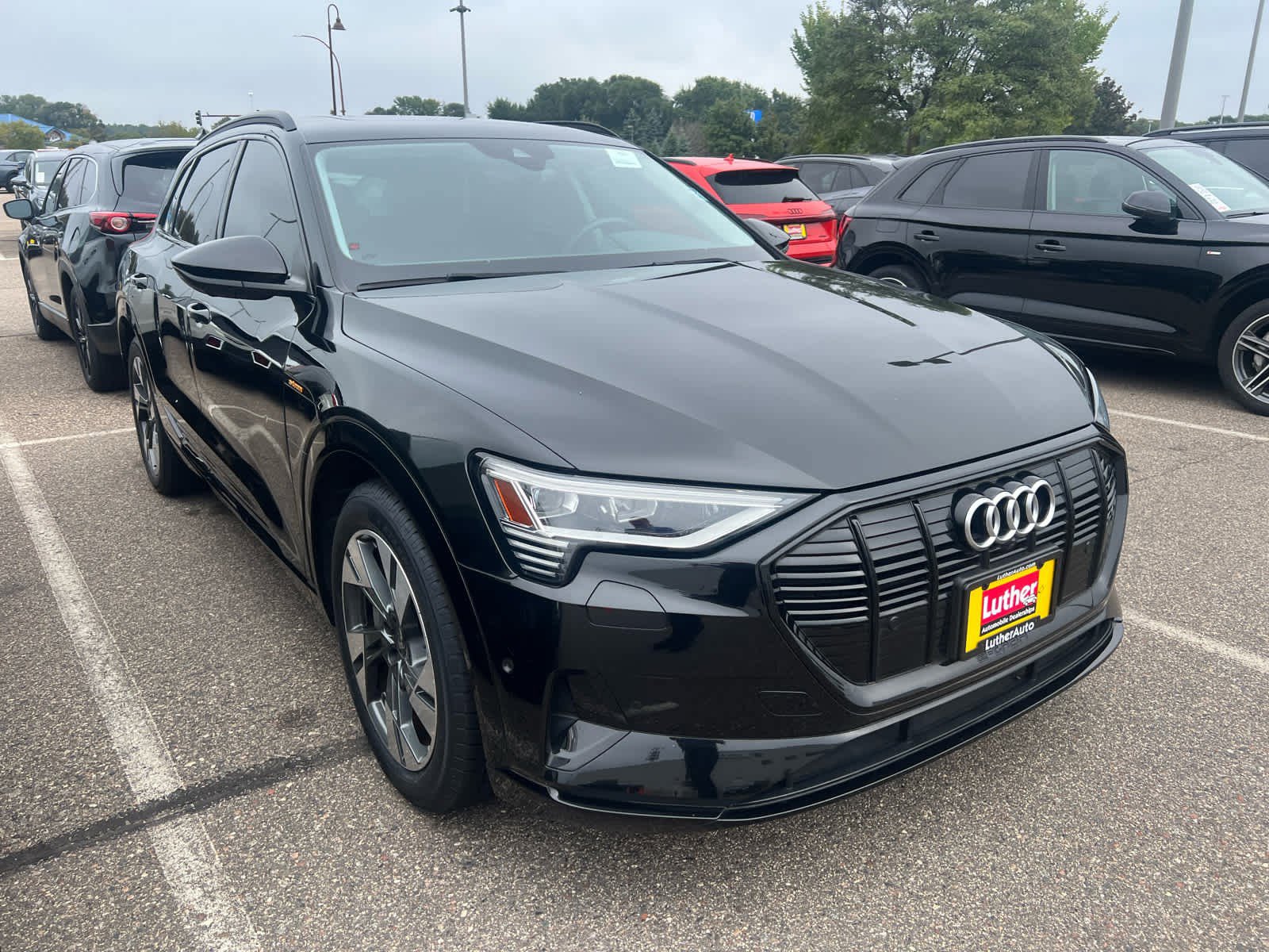 Used 2021 Audi e-tron Premium with VIN WA1AAAGE5MB019396 for sale in Brooklyn Center, Minnesota
