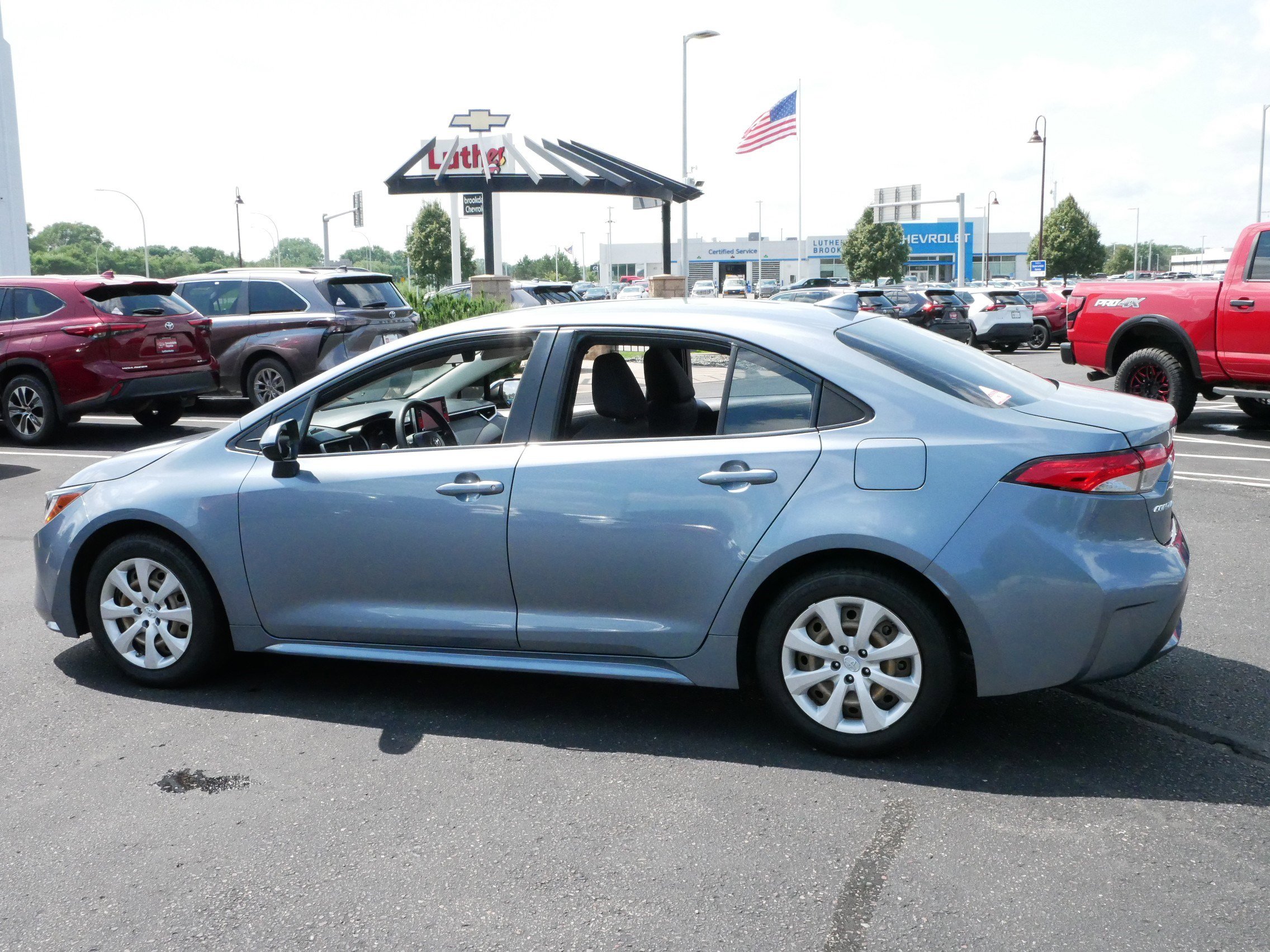 Certified 2021 Toyota Corolla LE with VIN JTDEPMAE6MJ179146 for sale in Brooklyn Center, Minnesota