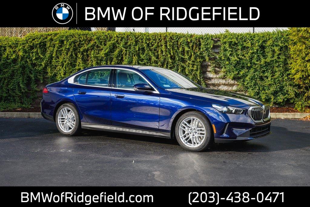 New 2025 Tanzanite Blue II Metallic BMW 530i xDrive image 1