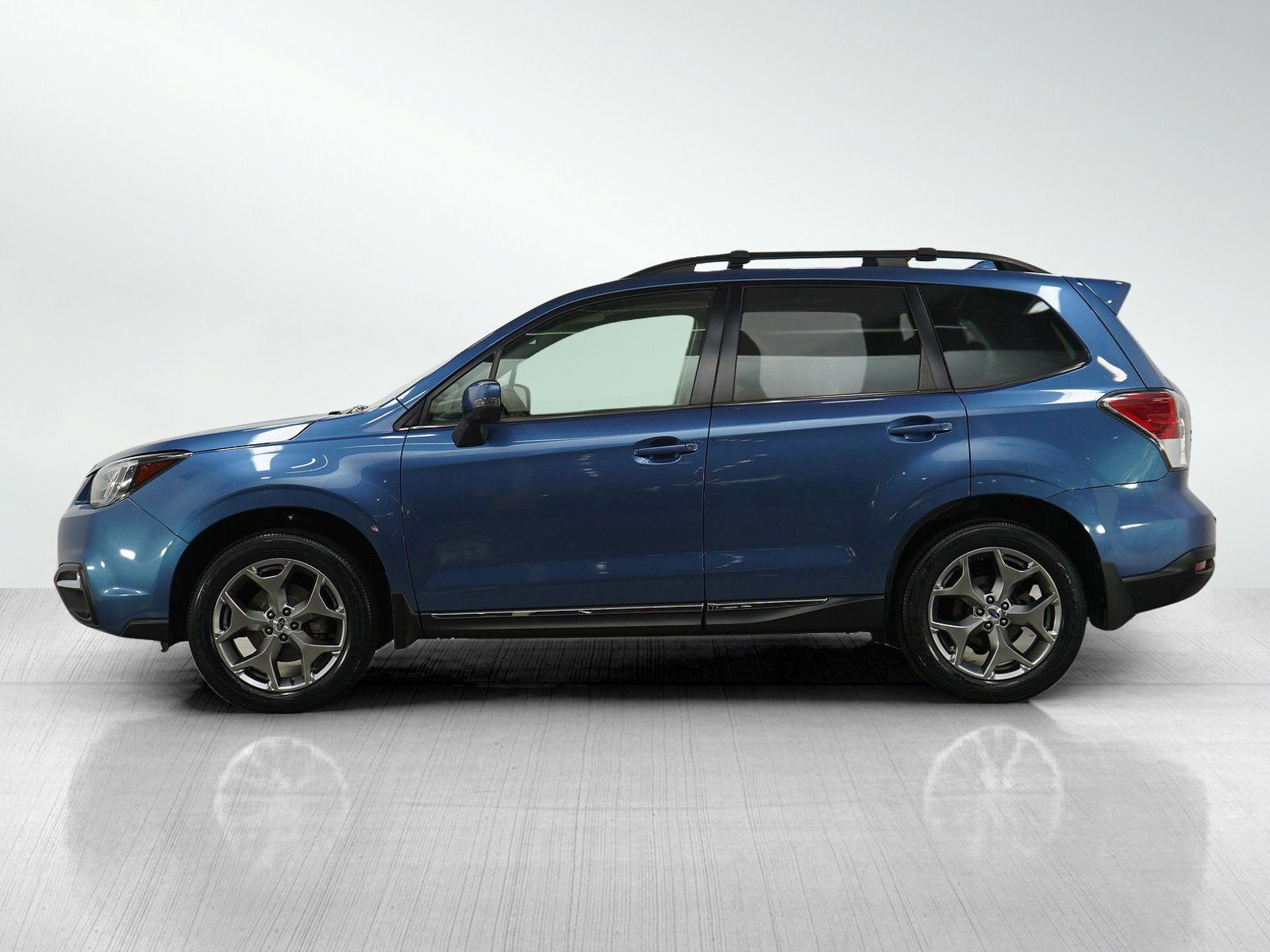 Used 2017 Subaru Forester Touring with VIN JF2SJATC5HH439209 for sale in Burnsville, Minnesota