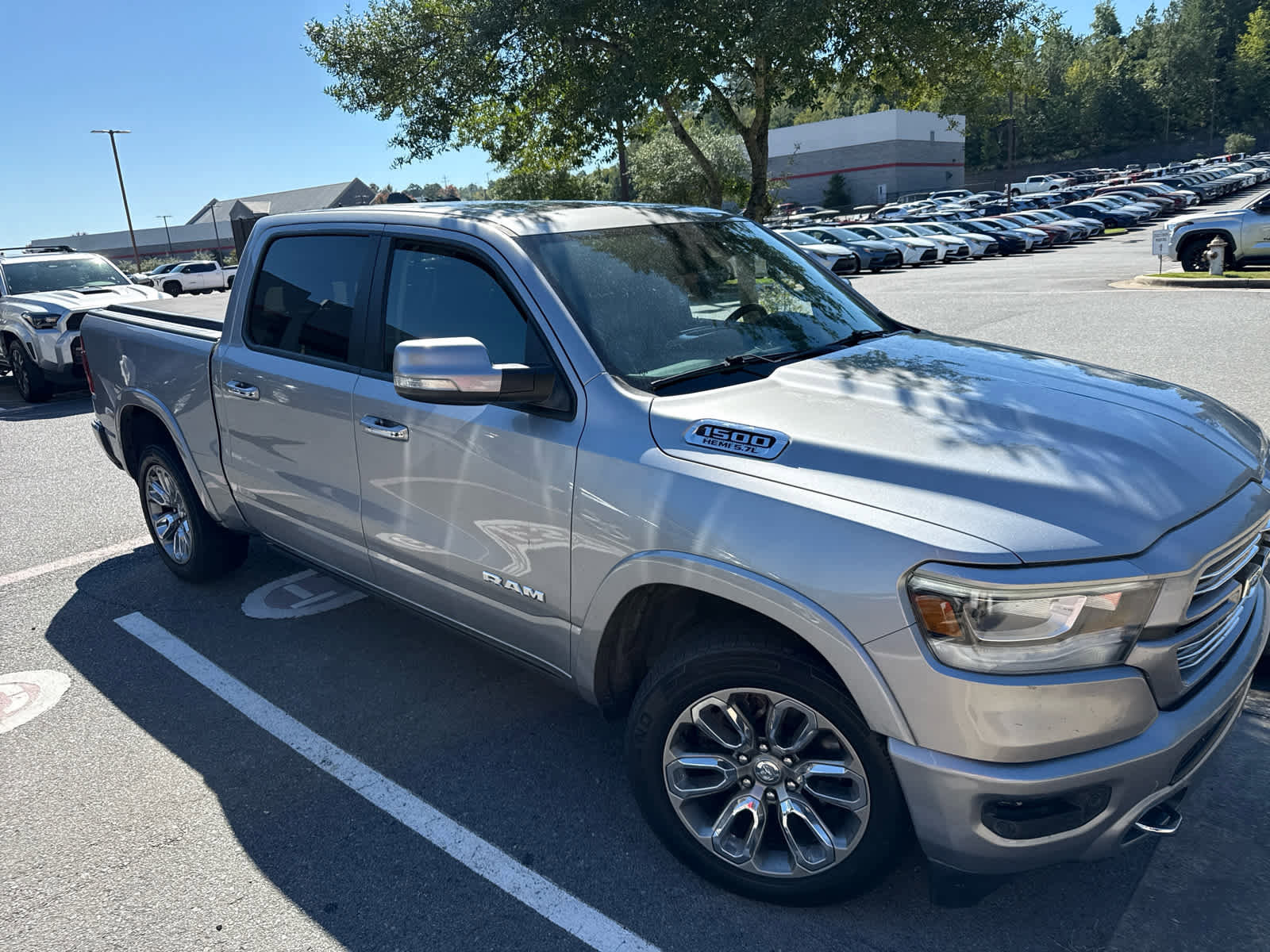 Used 2021 RAM Ram 1500 Pickup Laramie with VIN 1C6SRFJT9MN516335 for sale in Little Rock