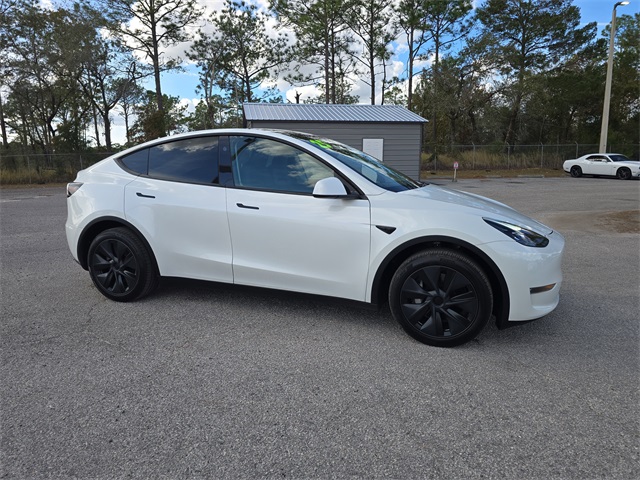 Used 2025 Tesla Model Y Long Range with VIN 7SAYGDEE6SA361053 for sale in Brooksville, FL