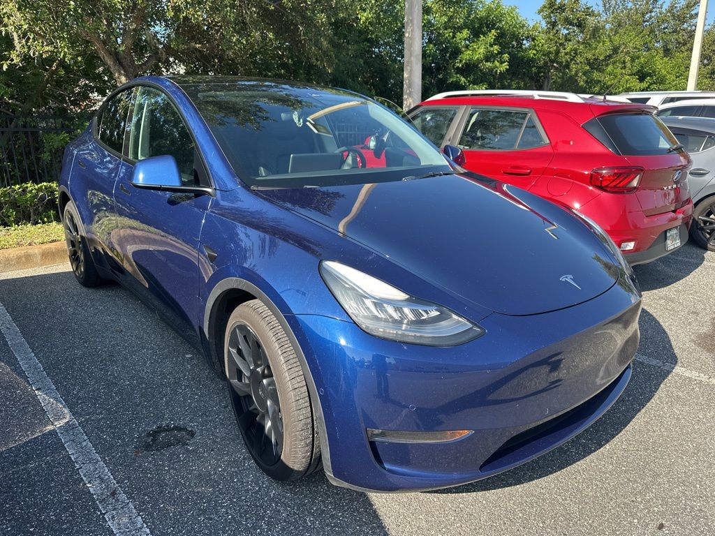 Used 2021 Tesla Model Y Long Range with VIN 5YJYGDEE3MF207936 for sale in Orlando, FL