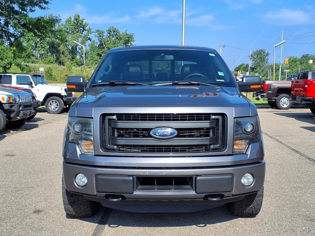 Used 2014 Ford F-150 FX4 with VIN 1FTFW1ET3EKG19222 for sale in Howell, MI