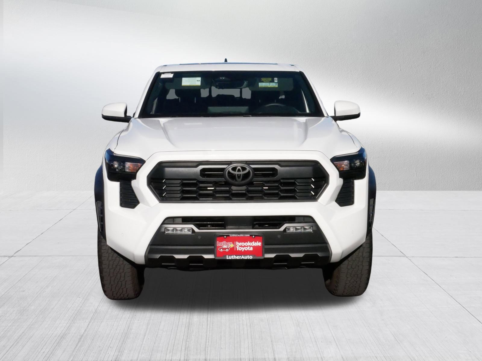 Used 2024 Toyota Tacoma TRD Off Road with VIN 3TMLB5JN2RM057809 for sale in Brooklyn Center, Minnesota