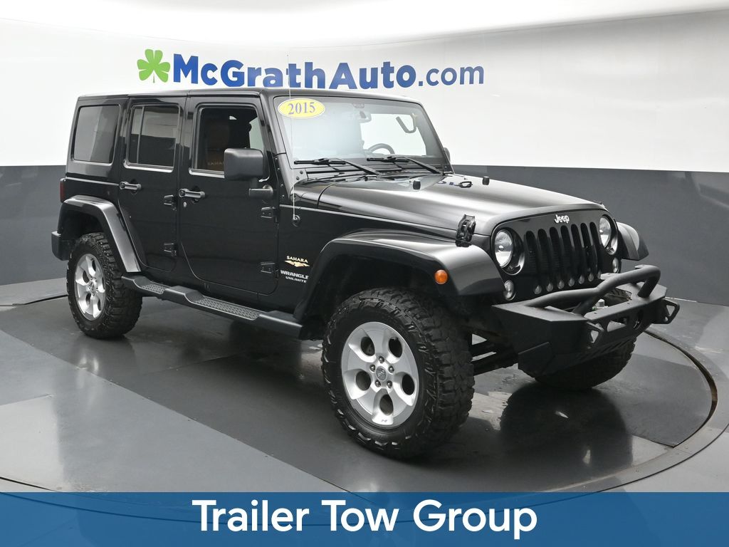 Used 2015 Jeep Wrangler Unlimited Sahara with VIN 1C4BJWEGXFL618237 for sale in Cedar Rapids, IA