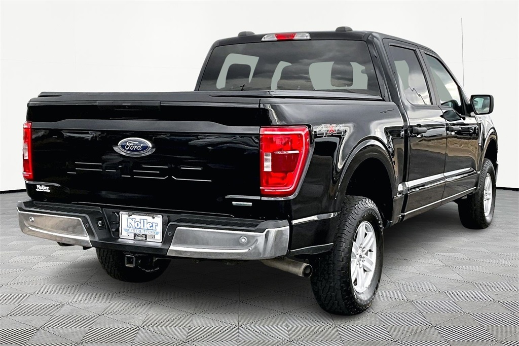 Used 2021 Ford F-150 XLT with VIN 1FTFW1E82MKD94690 for sale in Kansas City