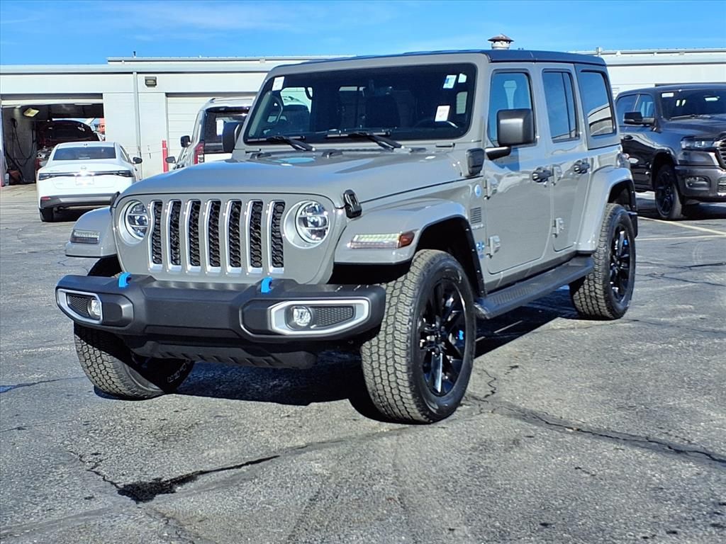 Used 2022 Jeep Wrangler Unlimited Sahara 4XE with VIN 1C4JJXP61NW232308 for sale in Kansas City