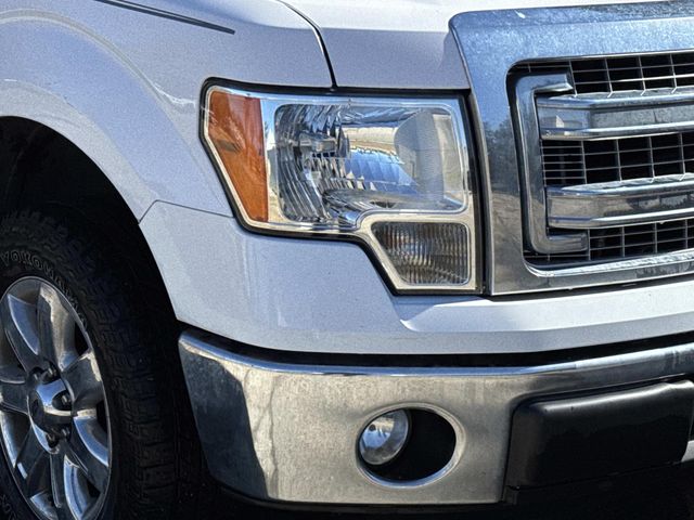 Used 2014 Ford F-150 XLT with VIN 1FTFW1CF7EKG47313 for sale in Plaquemine, LA