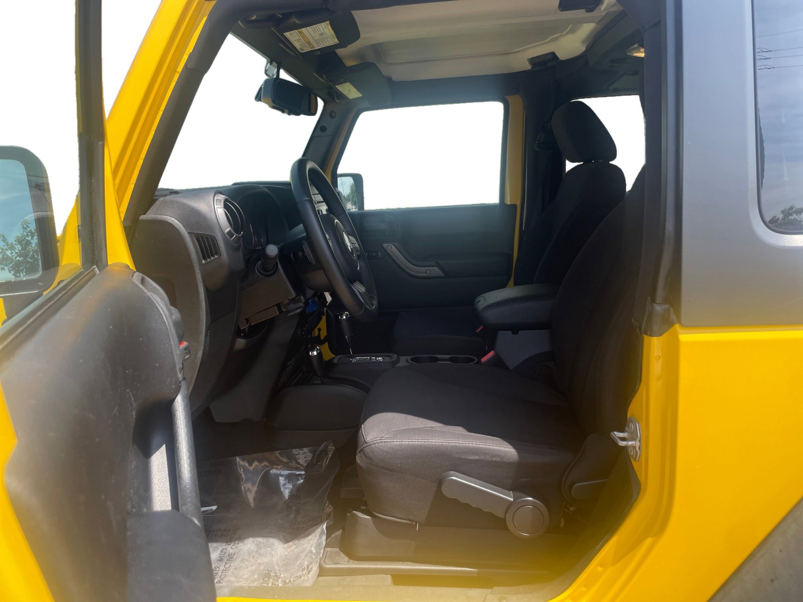 Used 2015 Jeep Wrangler Sport with VIN 1C4AJWAG3FL572221 for sale in Kansas City
