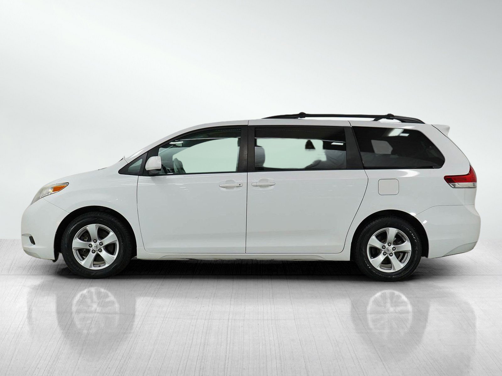 Used 2014 Toyota Sienna LE with VIN 5TDKK3DC4ES437786 for sale in Minneapolis, Minnesota