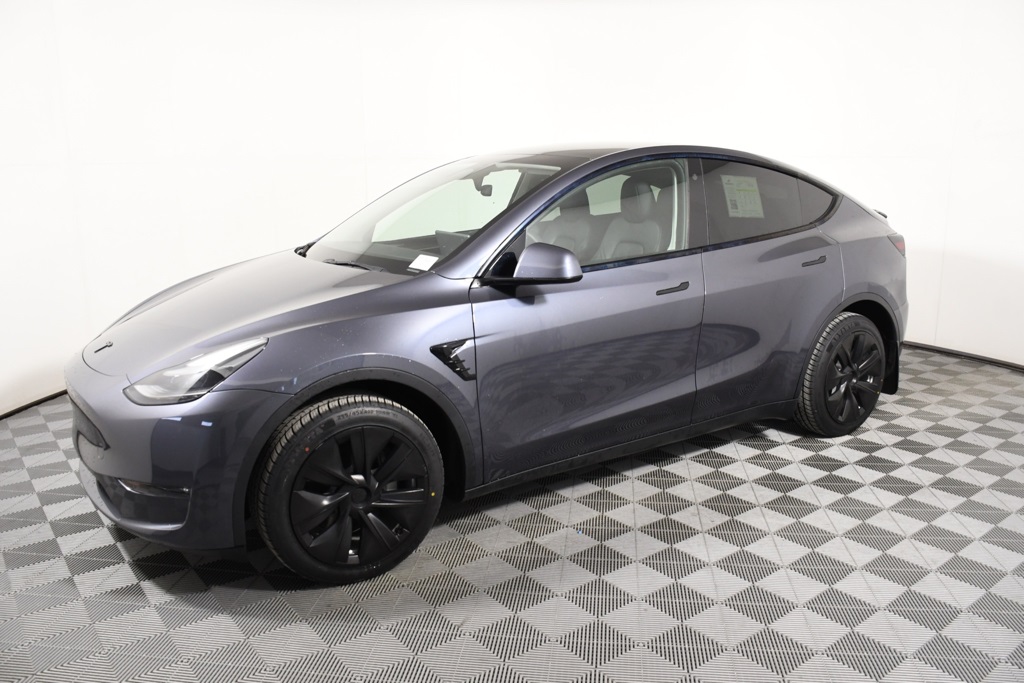 Used 2023 Tesla Model Y Long Range with VIN 7SAYGDEE9PF710538 for sale in Richfield, MN