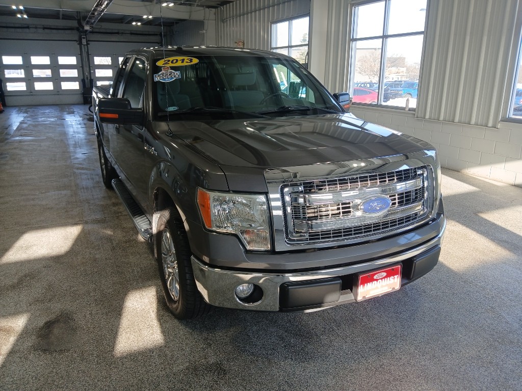 Used 2013 Ford F-150 XLT with VIN 1FTEX1CMXDKG42886 for sale in Bettendorf, IA