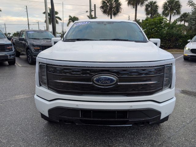 Used 2023 Ford F-150 Lightning Platinum with VIN 1FT6W1EV4PWG26404 for sale in Delray Beach, FL