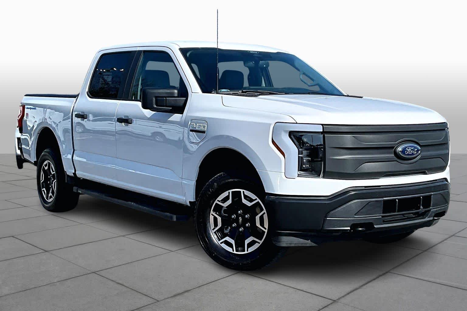 Certified 2022 Ford F-150 Lightning Pro with VIN 1FTVW1EL2NWG01296 for sale in Kennesaw, GA