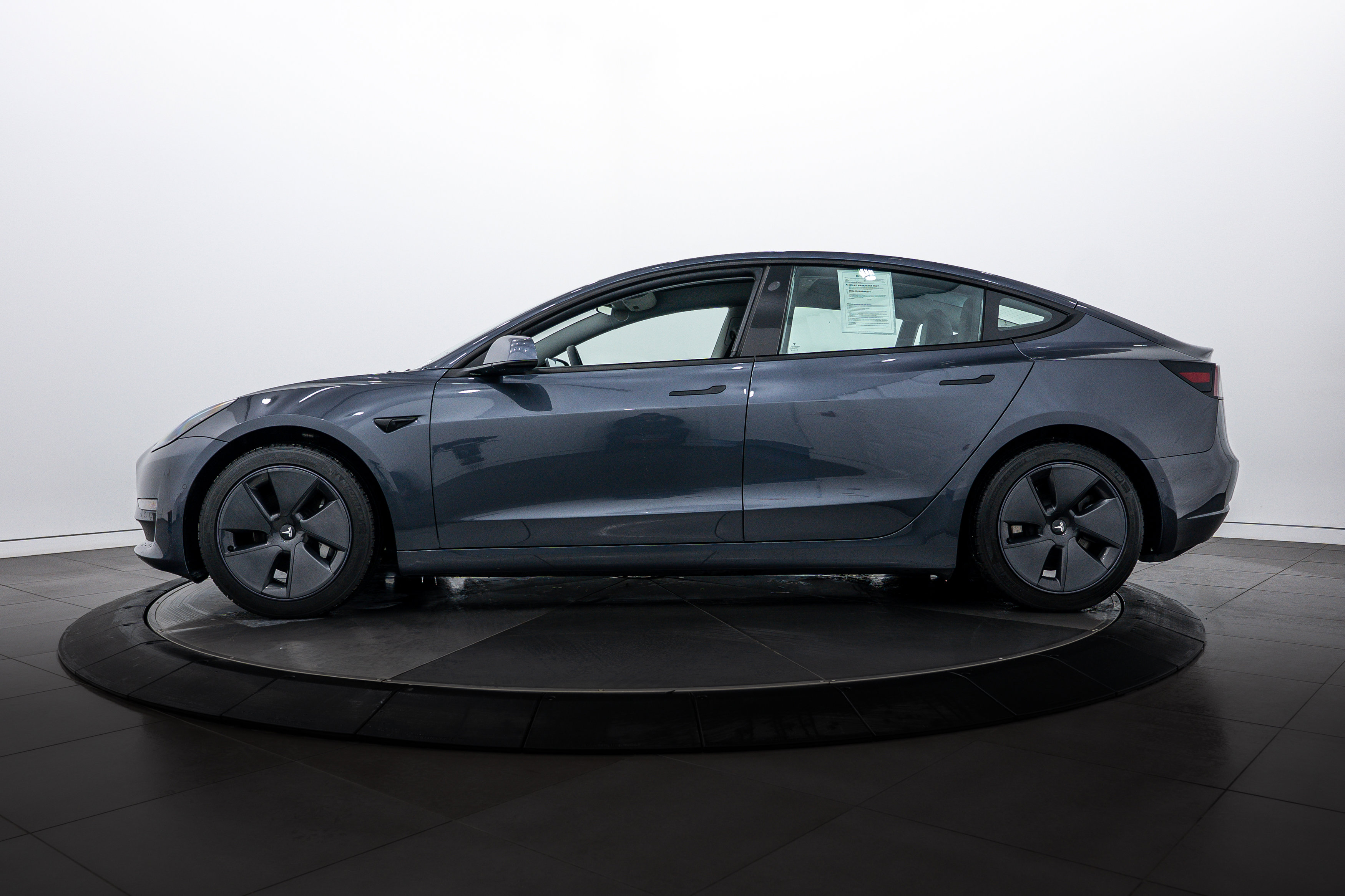 Used 2021 Tesla Model 3 Base with VIN 5YJ3E1EB3MF014822 for sale in Highland Park, IL