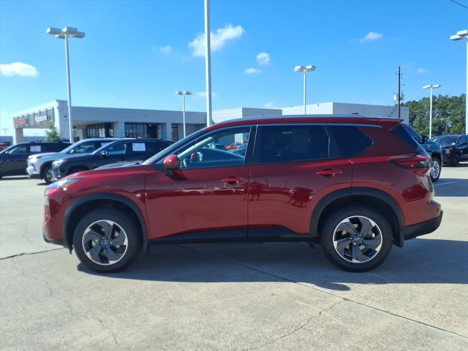 2024 Nissan Rogue SV Red at Robbins Nissan