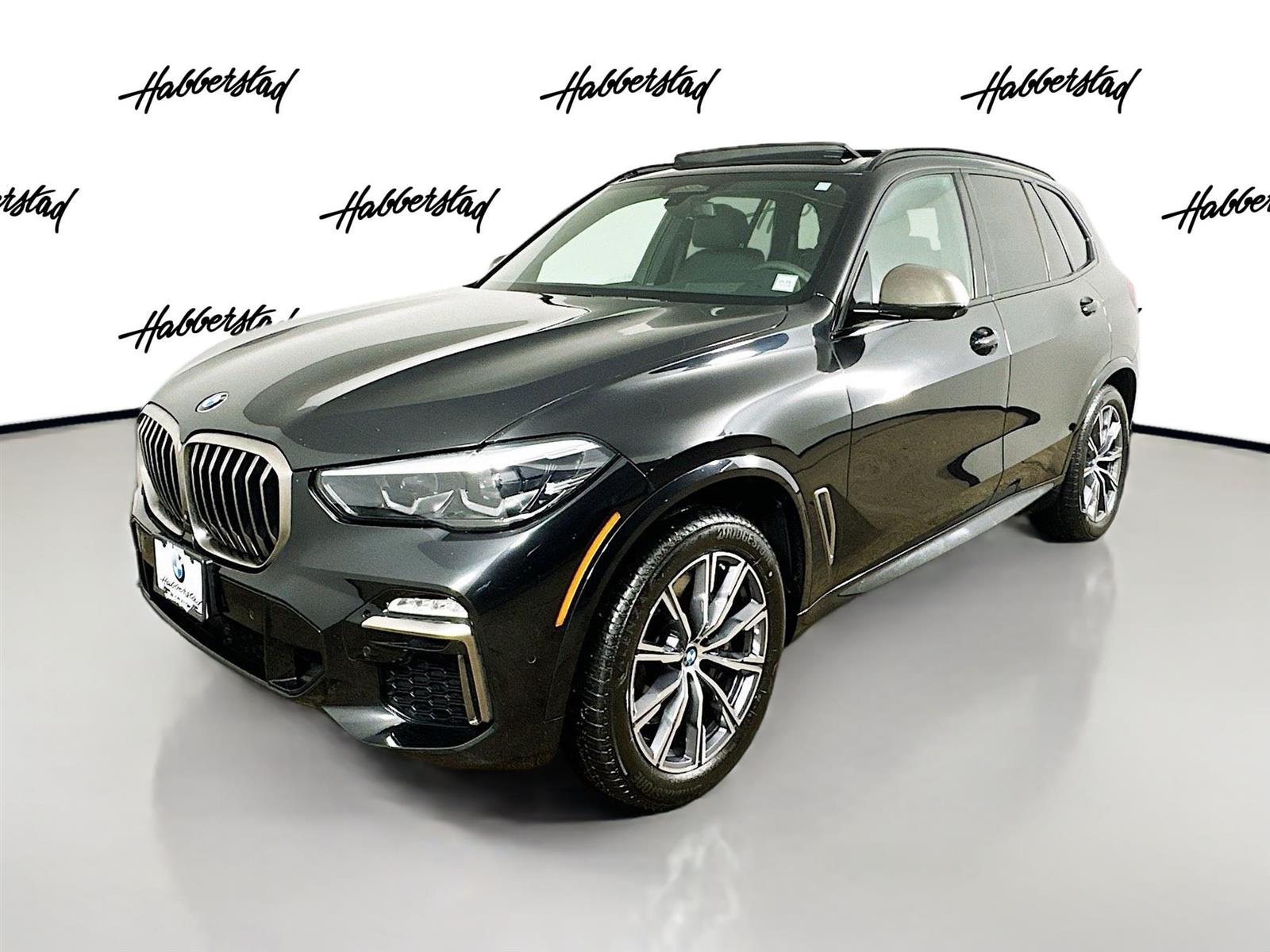 Used 2021 Black Sapphire Metallic BMW M50i image 1